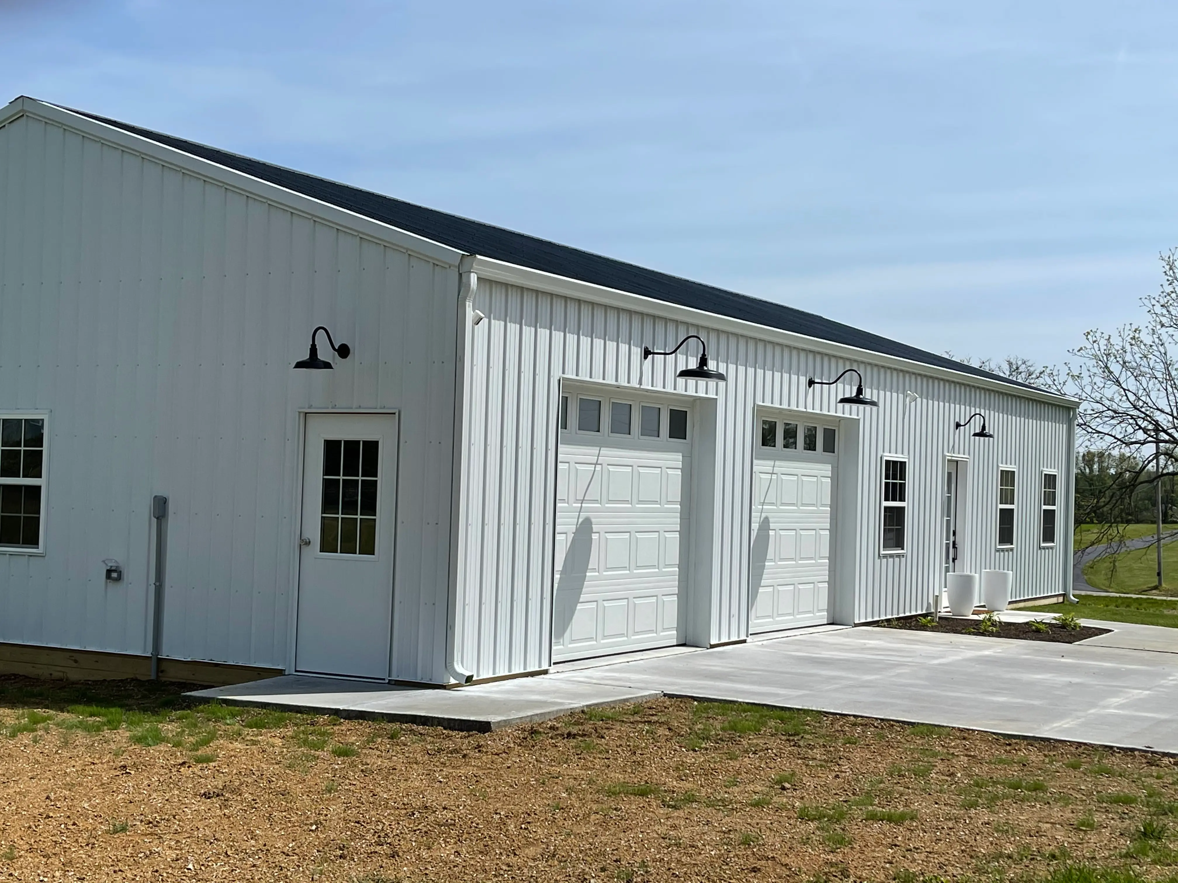 Commercial gutter installation on a metal building